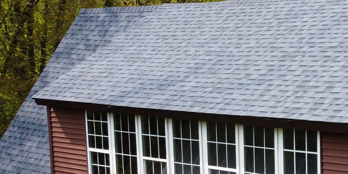 Closeup of new gray asphalt roof