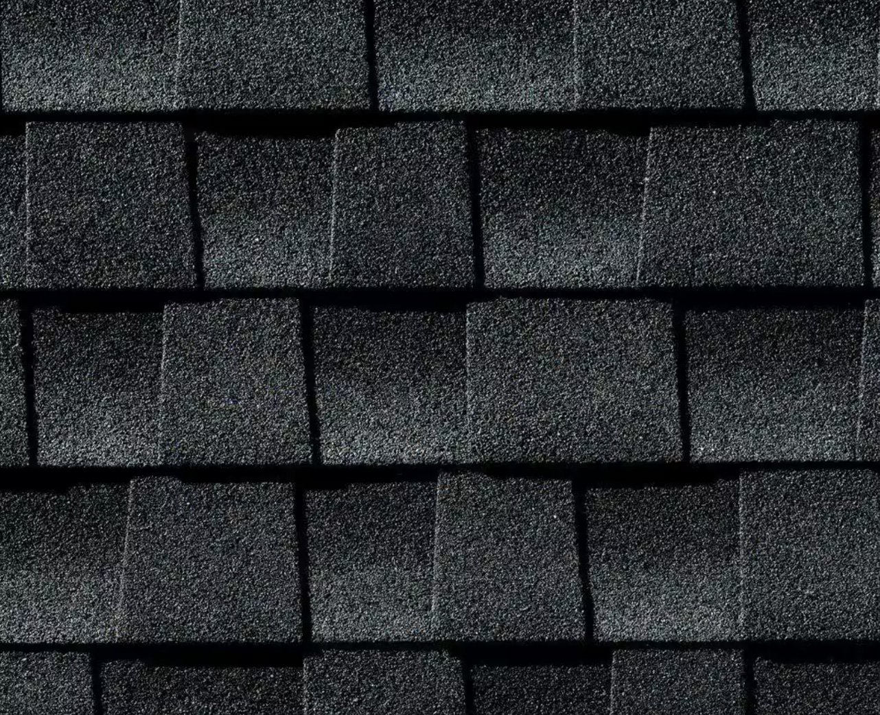 Black Roofing Tiles Close Up Black roofing tiles. Roofing solution.