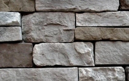 Gray Stone Wall with Rough Texture Gray stone wall with rough texture. Stacked stones.