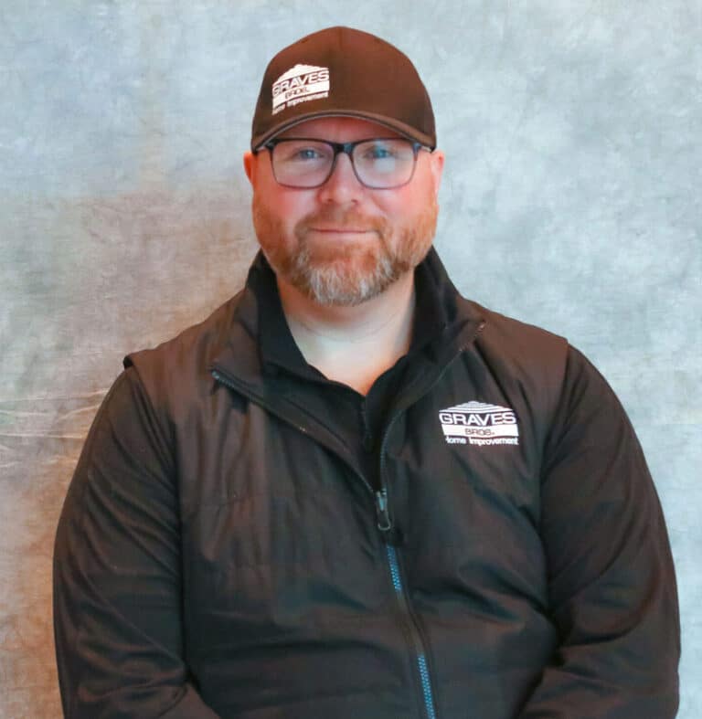 Man Wearing Black Jacket and Baseball Cap a man in a black jacket and hat