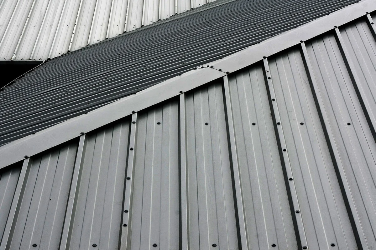 Close-up of metal building exterior panels Metal panels on building exterior. Industrial construction materials.