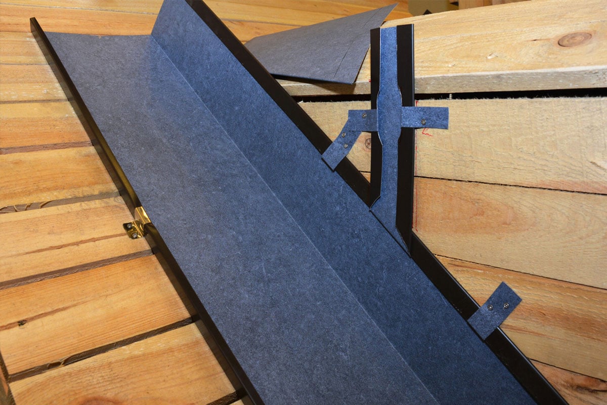 Roofing Felt Installation on Wooden Planks Roofing felt on wooden planks. A roofing material.