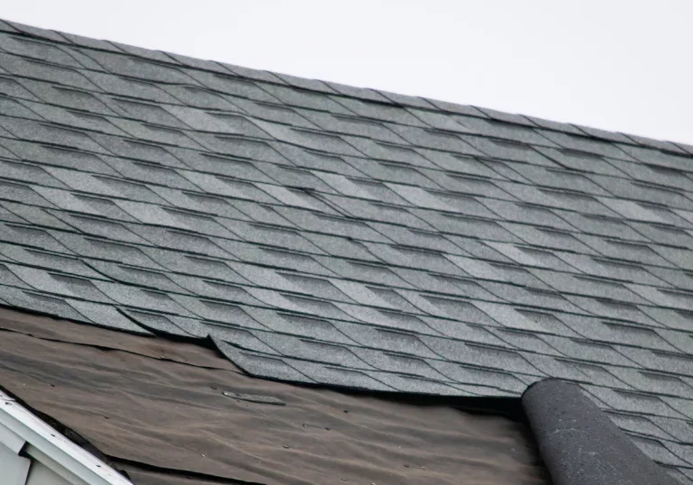 Damaged Shingles and Flashing